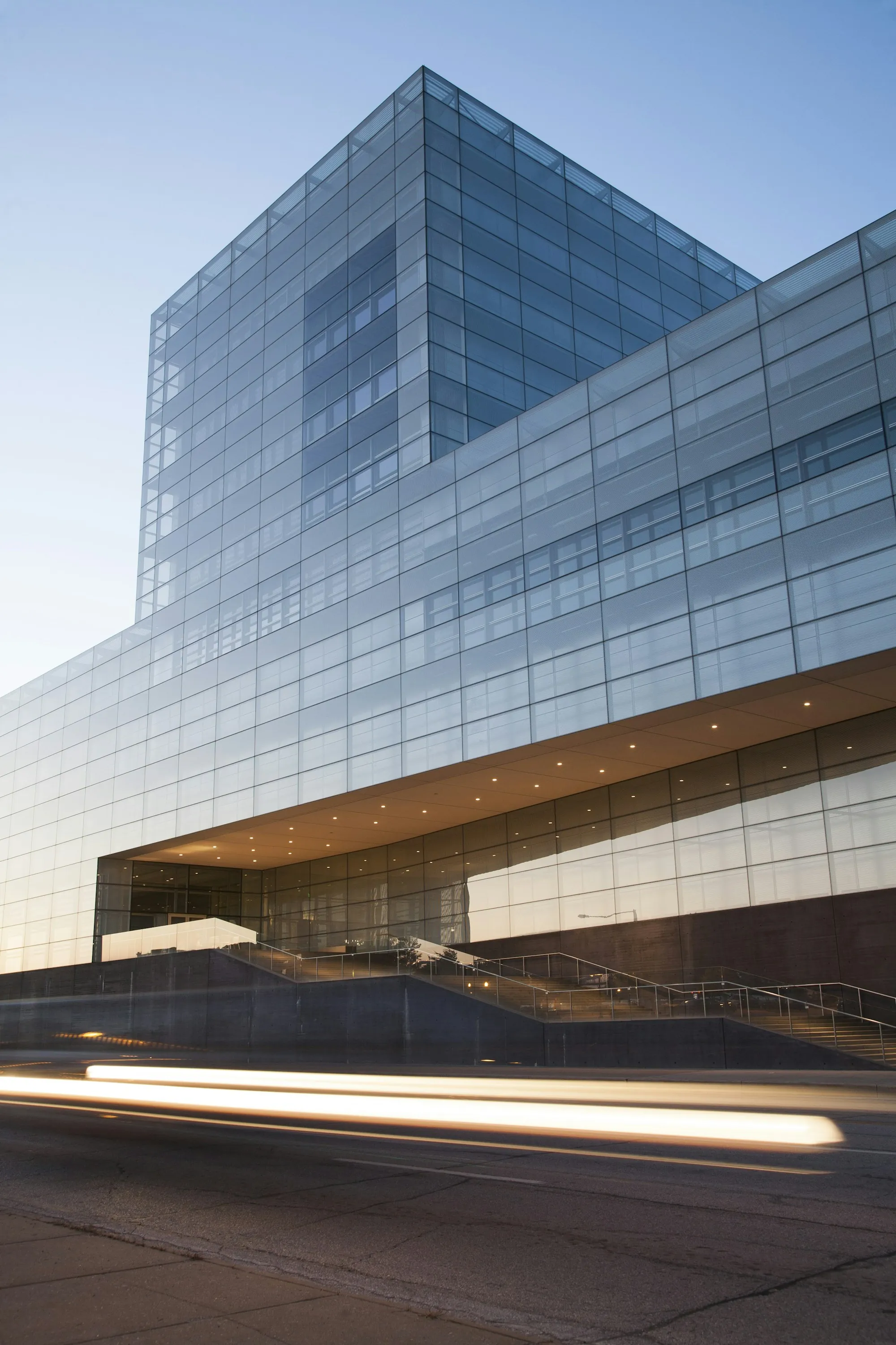 Glass office building with a covered entrance