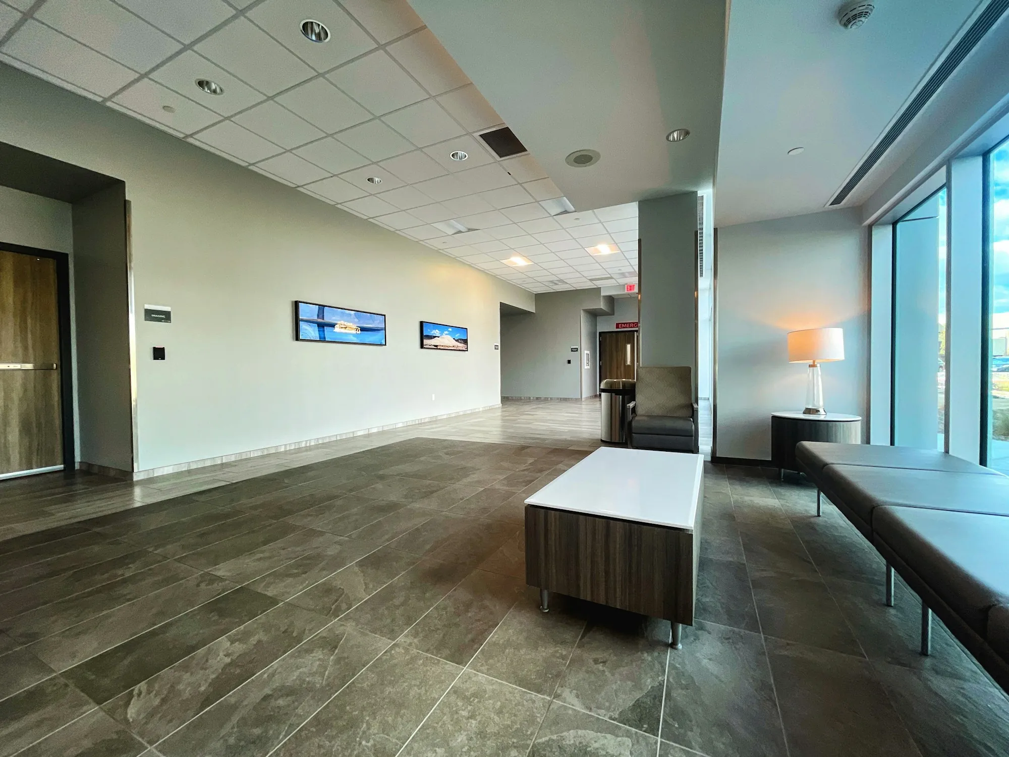 Office reception area with a wood-look tile floor